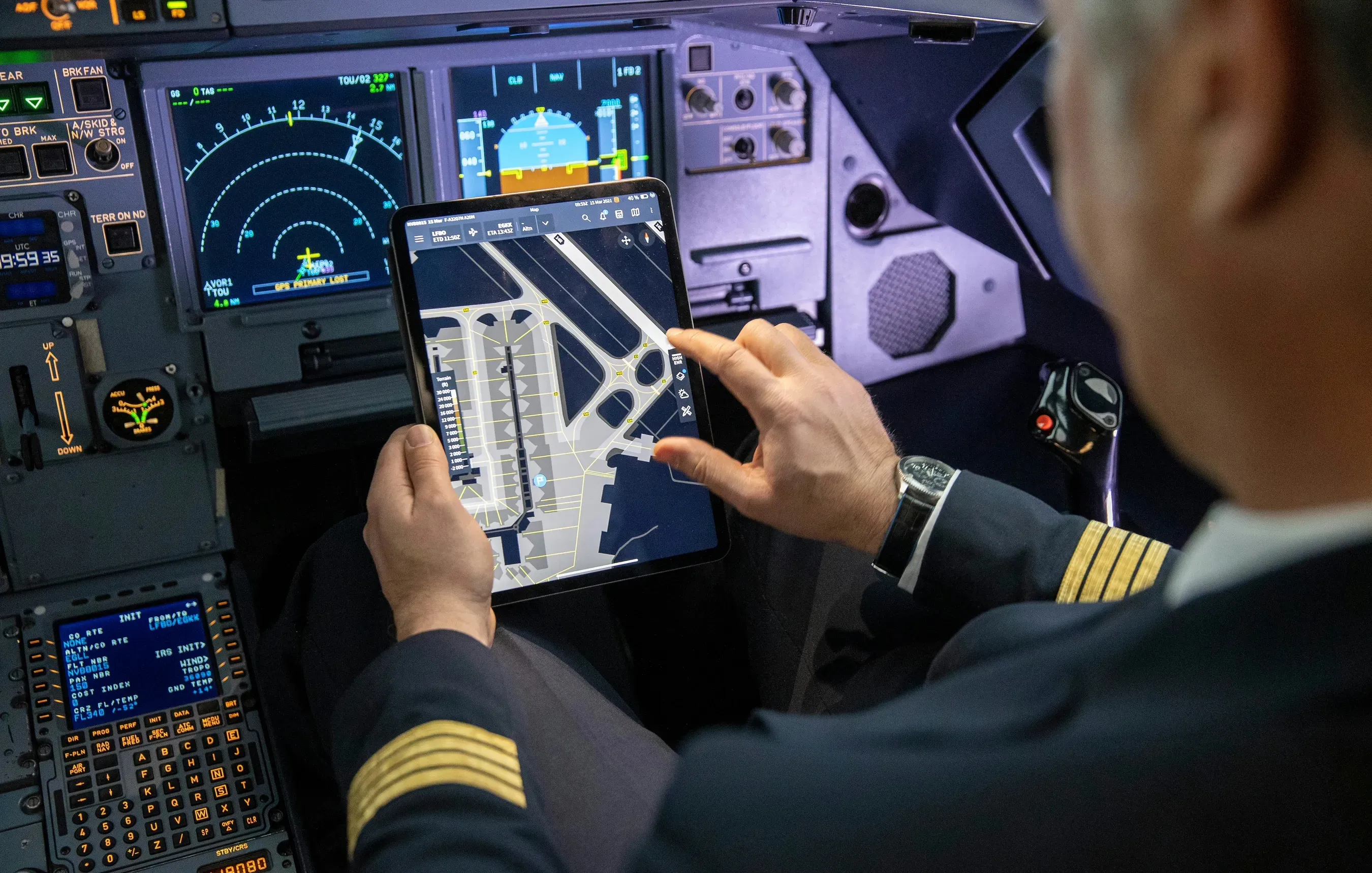 First Officer using the NAVBLUE Airport Moving Map solution